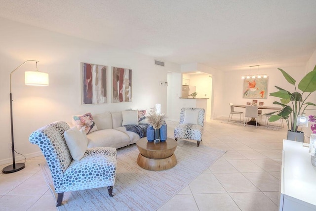 9785 Pineapple Tree Dr Unit 103, Boynton Beach, FL 33436 - living room featuring light tile patterned floors