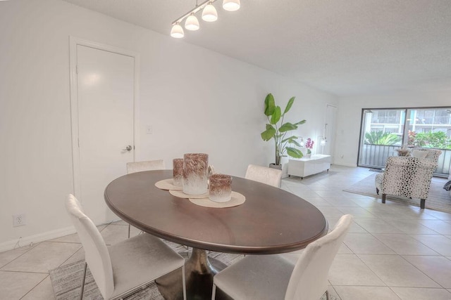 9785 Pineapple Tree Dr Unit 103, Boynton Beach, FL 33436 - dining room with light tile patterned floors