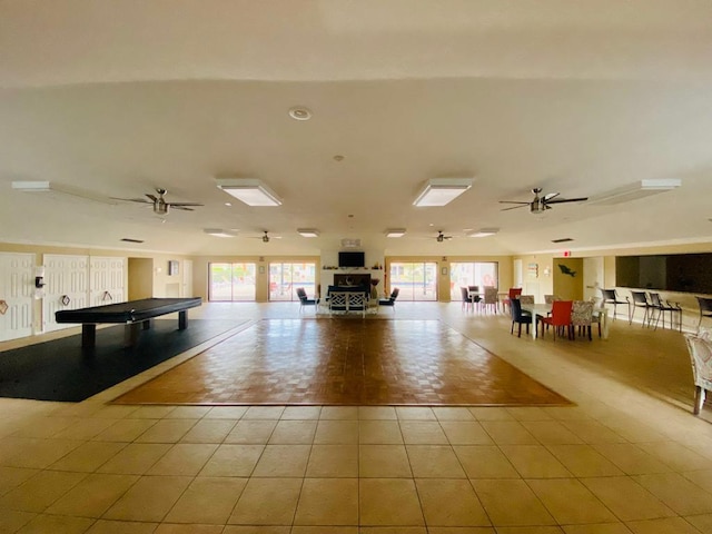 interior space featuring billiards, tile patterned flooring, and a ceiling fan