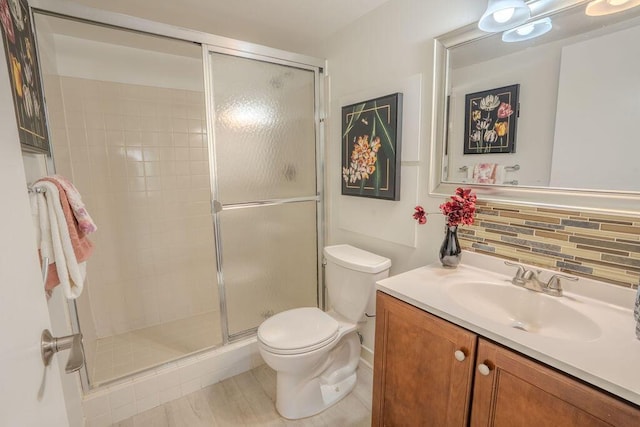9785 Pineapple Tree Dr Unit 103, Boynton Beach, FL 33436 - full bathroom with vanity, a shower stall, and tasteful backsplash