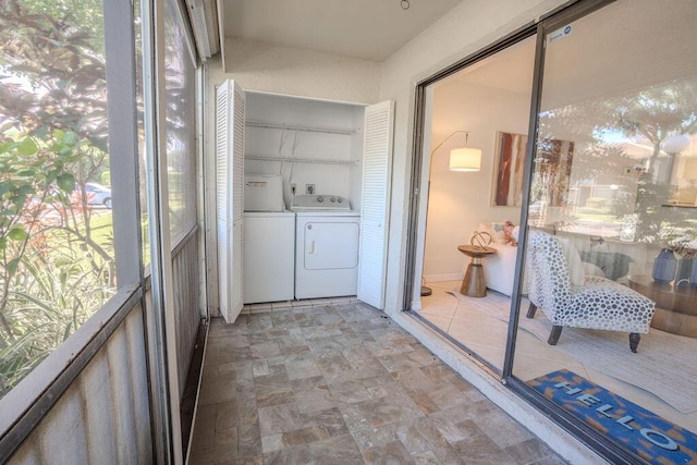 9785 Pineapple Tree Dr Unit 103, Boynton Beach, FL 33436 - sunroom with washing machine and dryer and plenty of natural light