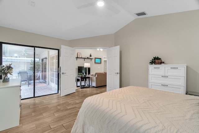 bedroom with visible vents, light wood-style floors, vaulted ceiling, ceiling fan, and access to outside