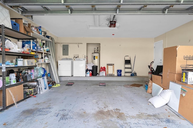 garage featuring water heater, separate washer and dryer, electric panel, and a garage door opener