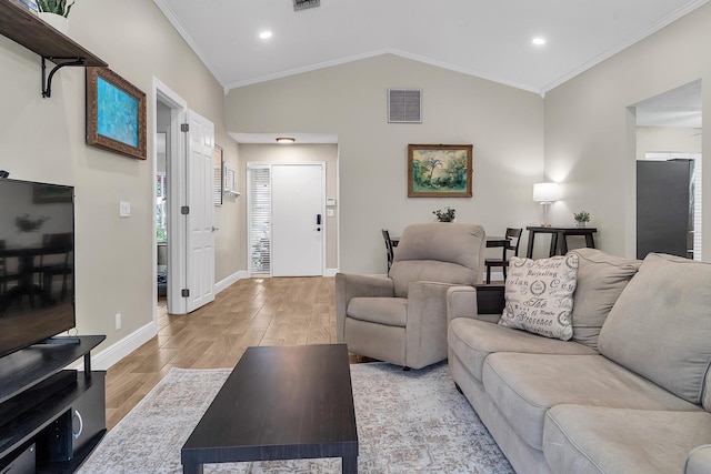 living room with baseboards, visible vents, lofted ceiling, crown molding, and light wood-style floors