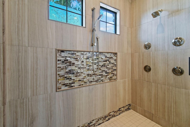 full bathroom with tiled shower