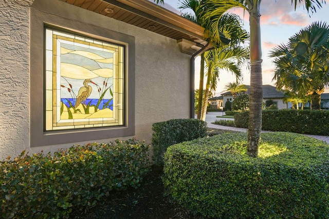 exterior space with stucco siding