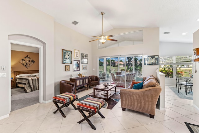 living room with visible vents, plenty of natural light, and light tile patterned floors