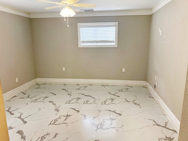 spare room with a ceiling fan, visible vents, crown molding, and baseboards