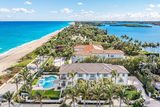 aerial view featuring a water view and a view of the beach