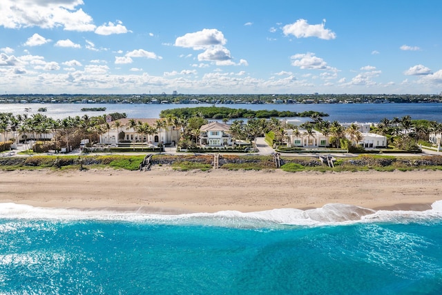 drone / aerial view with a water view and a view of the beach