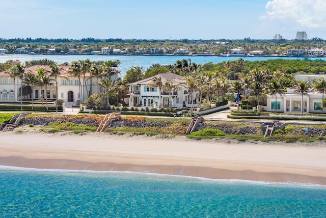 bird's eye view with a beach view and a water view