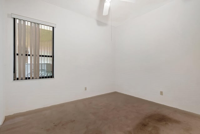 unfurnished room with ceiling fan