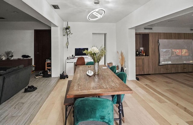 13701 NE 1st Ave, Miami, FL 33161 - dining space with light wood-style floors and visible vents