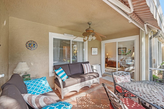 view of patio / terrace with ceiling fan, an outdoor hangout area, and outdoor dining space