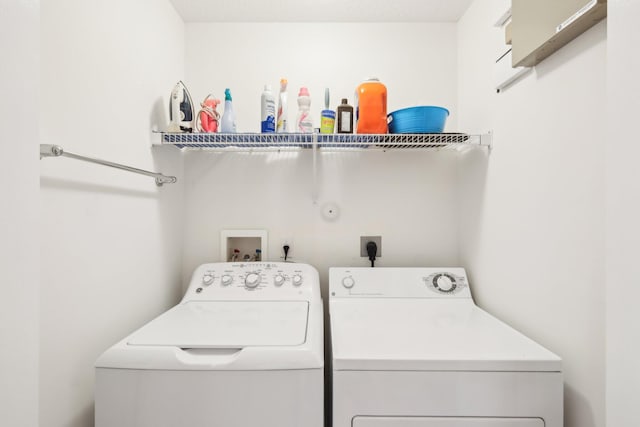 laundry room with laundry area and washer and dryer