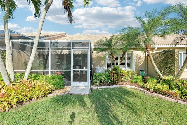 view of yard with a lanai