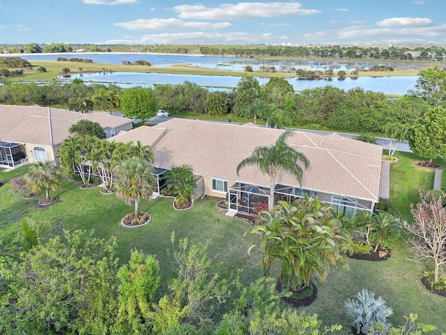 drone / aerial view with a water view