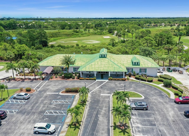 birds eye view of property featuring view of golf course