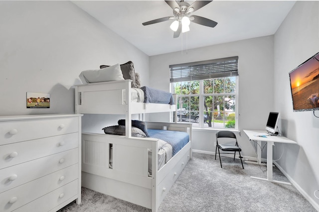 bedroom featuring carpet, baseboards, and ceiling fan