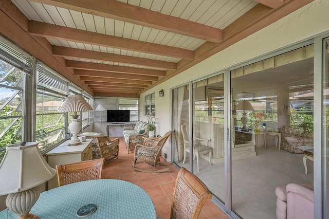 sunroom / solarium with beam ceiling and wood ceiling