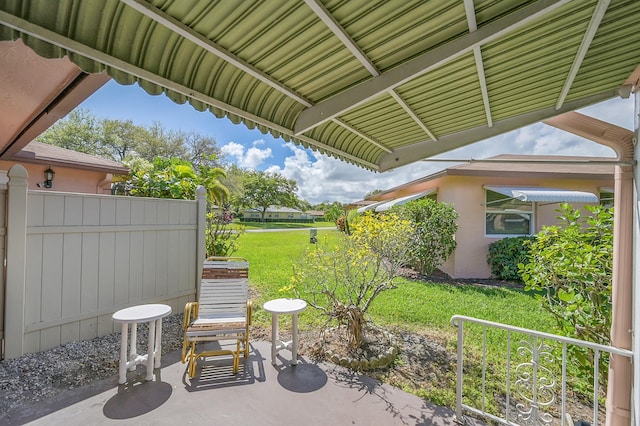 view of patio with fence