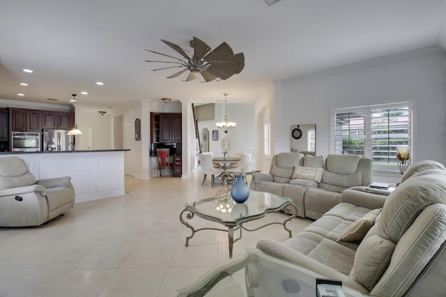 living area featuring an inviting chandelier, light tile patterned floors, crown molding, and recessed lighting