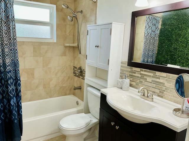 bathroom with tasteful backsplash, shower / bath combination with curtain, toilet, and vanity