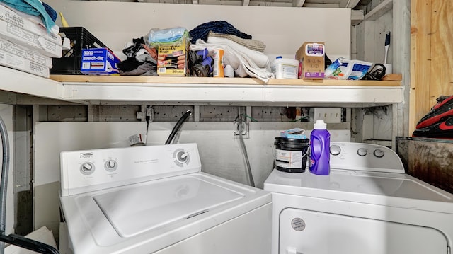 washroom featuring laundry area and washer and clothes dryer