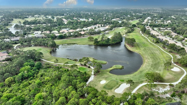 bird's eye view with a water view and view of golf course