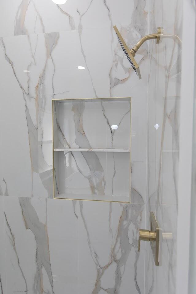 details with a marble finish shower