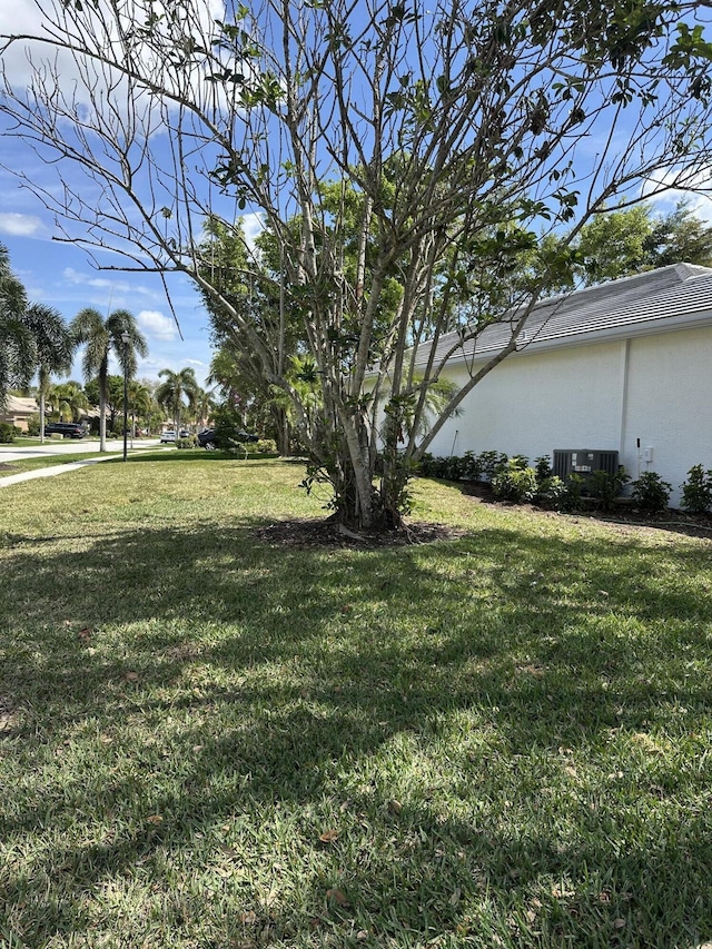 view of yard featuring central AC