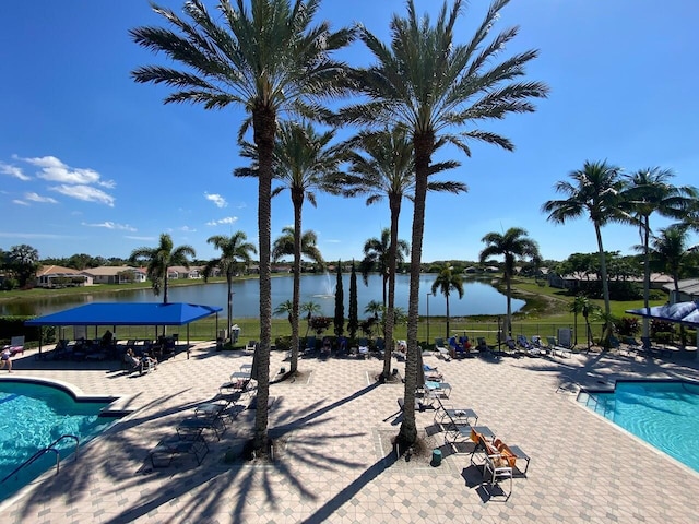 8232 Grand Messina Cir, Boynton Beach, FL 33472 - community pool featuring a water view and a patio area