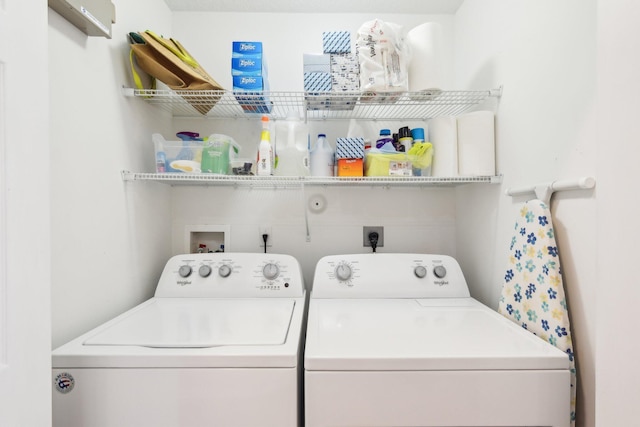 laundry room with laundry area and washer and clothes dryer