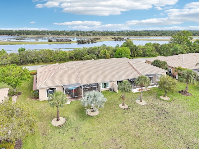 drone / aerial view featuring a water view