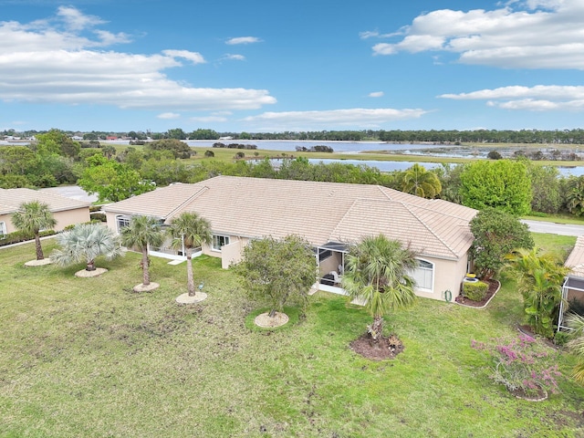 bird's eye view with a water view