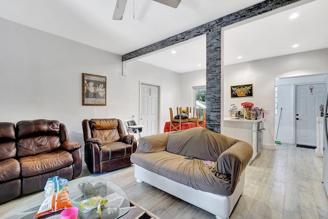 living room with recessed lighting, beamed ceiling, light wood finished floors, and ceiling fan