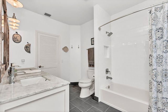 bathroom with a sink, double vanity, toilet, tile patterned flooring, and shower / bath combination with curtain