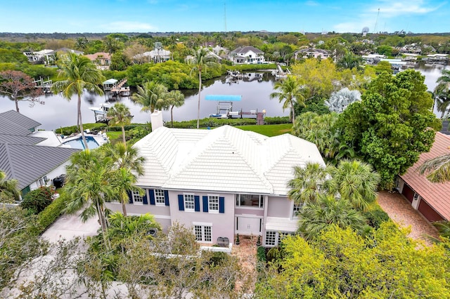 bird's eye view featuring a residential view and a water view