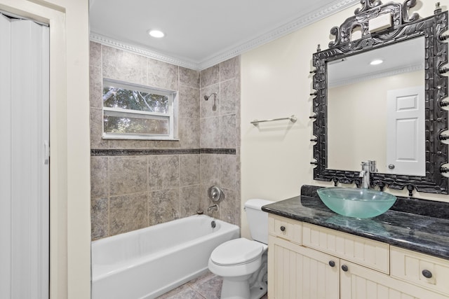 bathroom with crown molding, shower / bath combination, toilet, vanity, and tile patterned floors