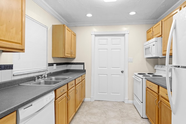 kitchen with white appliances, dark countertops, ornamental molding, a sink, and recessed lighting