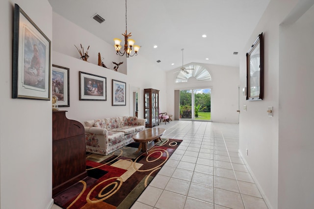 3190 SE Carrick Green Ct, Port Saint Lucie, FL 34952 - living area featuring light tile patterned floors, a chandelier, lofted ceiling, recessed lighting, and baseboards