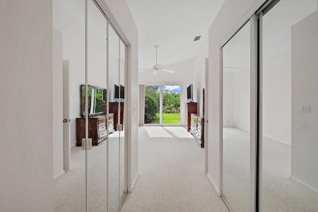 3190 SE Carrick Green Ct, Port Saint Lucie, FL 34952 - corridor with light carpet, baseboards, and a high ceiling