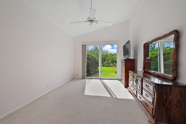 3190 SE Carrick Green Ct, Port Saint Lucie, FL 34952 - spare room featuring carpet floors, ceiling fan, baseboards, and high vaulted ceiling