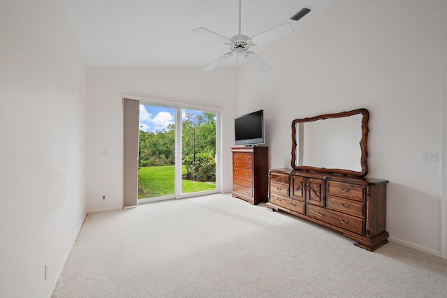 3190 SE Carrick Green Ct, Port Saint Lucie, FL 34952 - unfurnished living room with carpet floors, baseboards, ceiling fan, and high vaulted ceiling