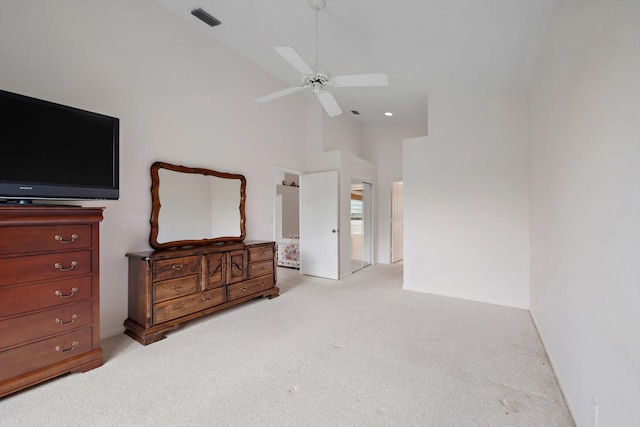 3190 SE Carrick Green Ct, Port Saint Lucie, FL 34952 - unfurnished bedroom featuring light colored carpet, high vaulted ceiling, and a ceiling fan