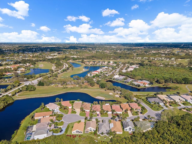 3190 SE Carrick Green Ct, Port Saint Lucie, FL 34952 - aerial view of property and surrounding area with a large body of water, nearby suburban area, and a local golf course
