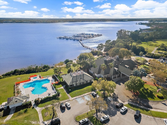 3190 SE Carrick Green Ct, Port Saint Lucie, FL 34952 - bird's eye view of a nearby body of water and a pool area