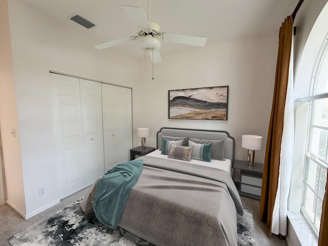 3190 SE Carrick Green Ct, Port Saint Lucie, FL 34952 - carpeted bedroom with a closet, a ceiling fan, and baseboards