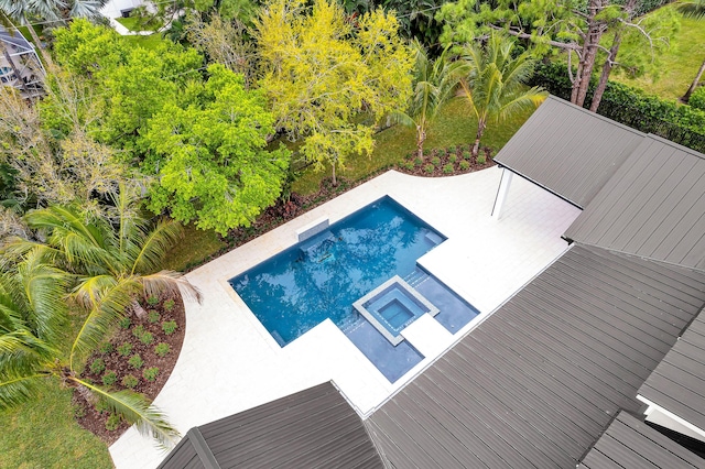 view of swimming pool featuring a patio