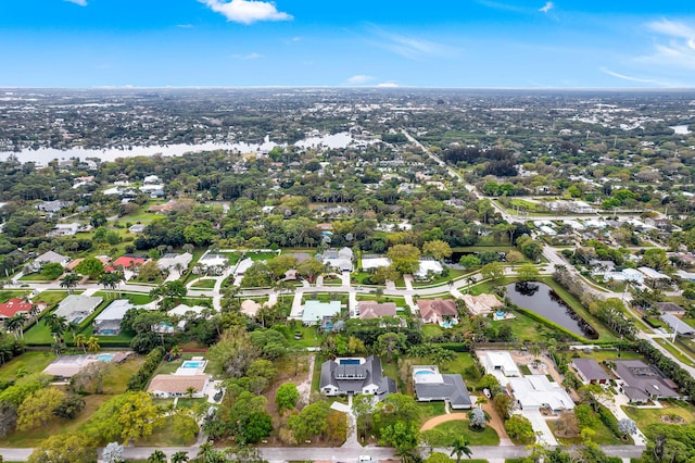 aerial view with a water view and a residential view